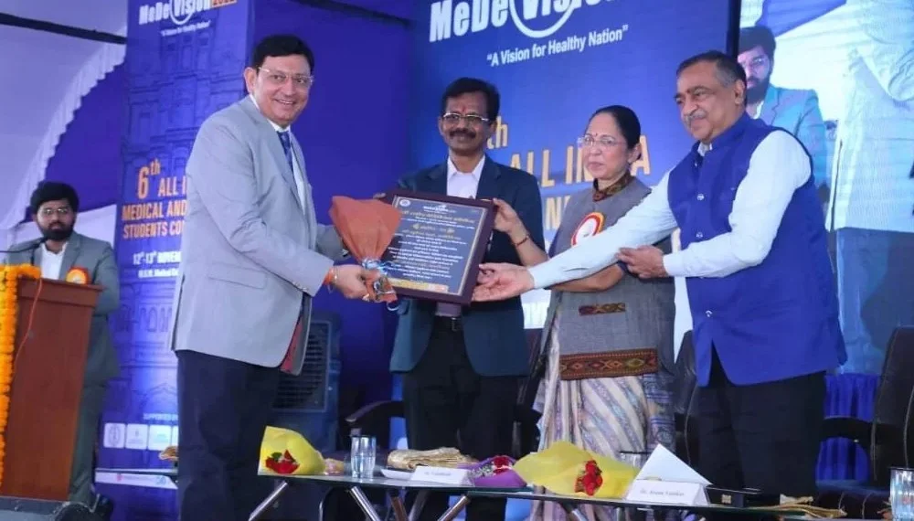 Dignitaries presenting structural development award layout